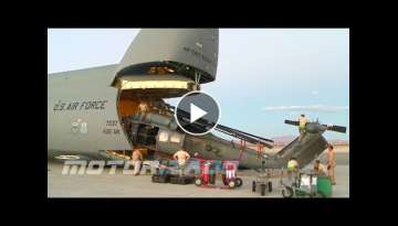 Loading HH-60 Pavehawk Helicopters onto a C-5 Galaxy Cargo Aircraft