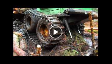 John Deere 1110D in mud, difficult conditions